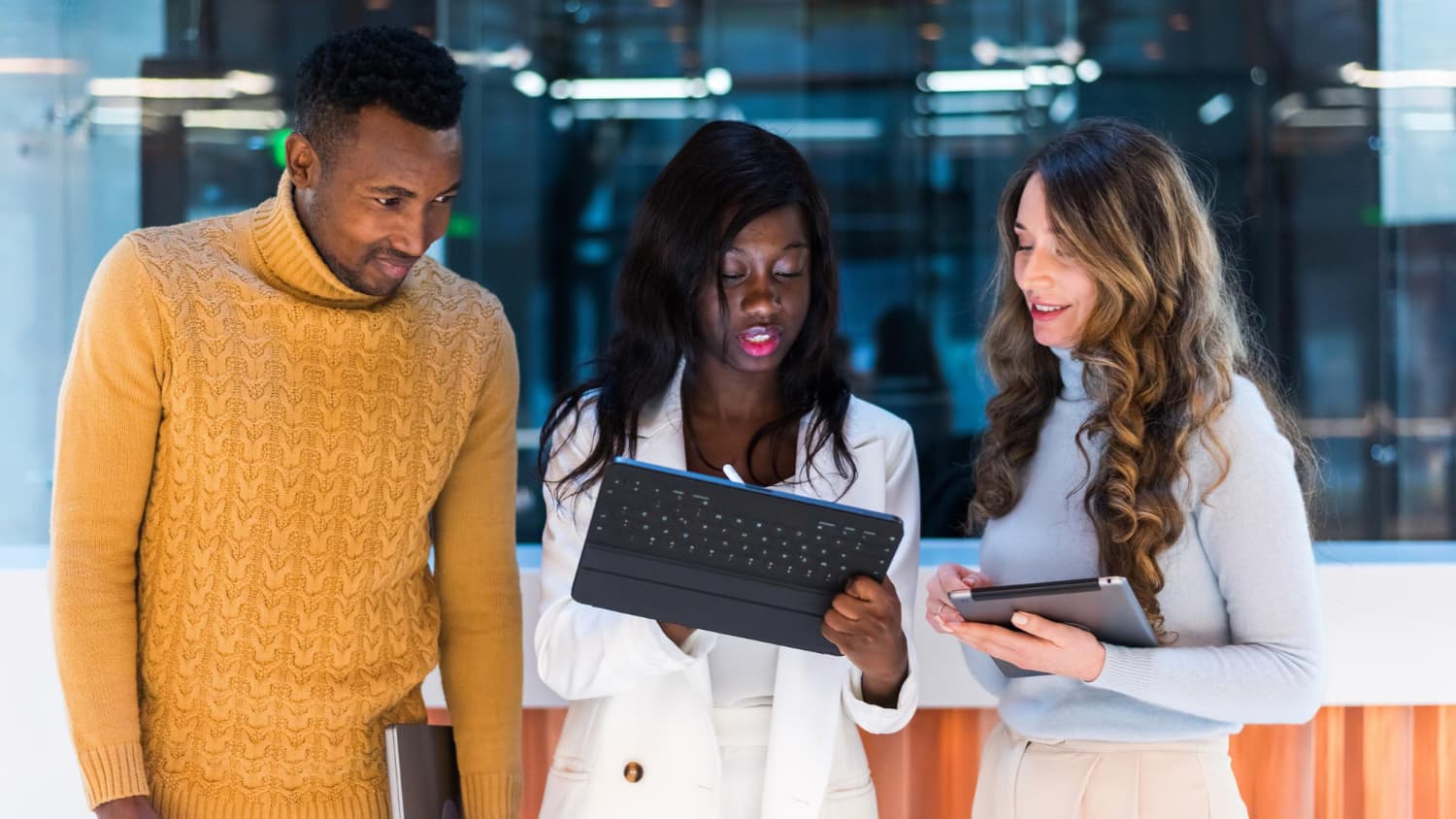 Technology team reviewing plans on a tablet
